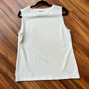 Ann Taylor sleeveless high neck blouse. Cream color size L